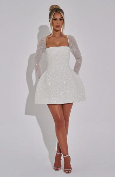 Josefin | Sheer Sleeve Sparkle Tulip Mini Dress